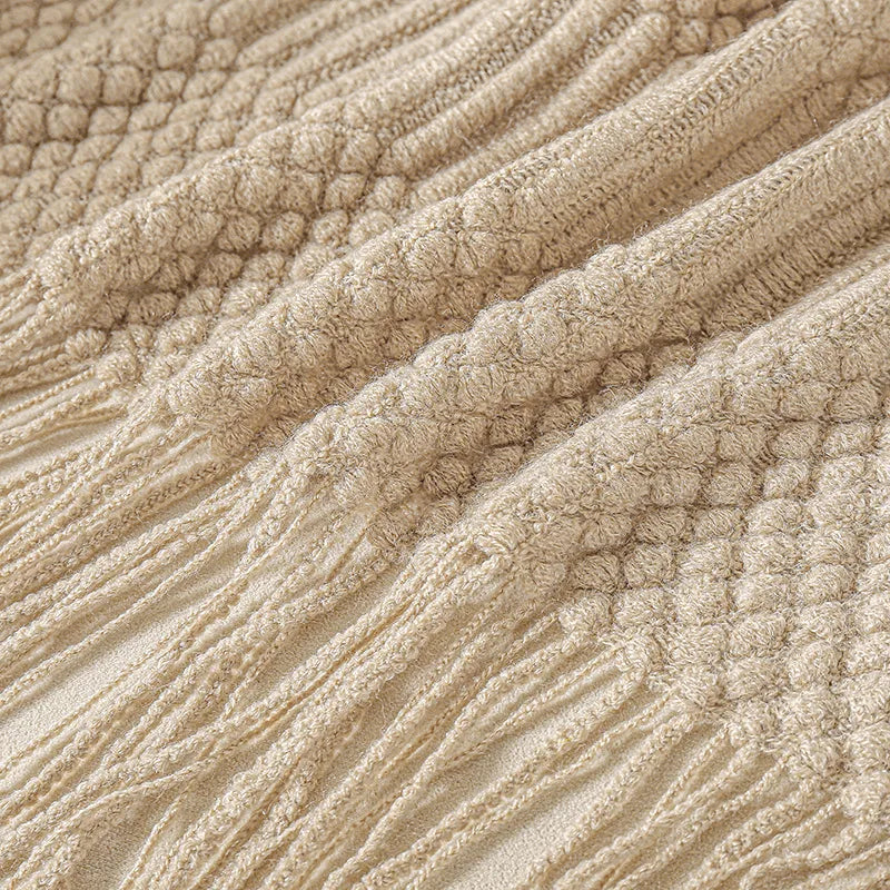 Kvaster og strikmønster på beige plaid — detalje, Bo Studio
