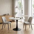 Rundt spisebord i marmoreret sten — Bo Studio